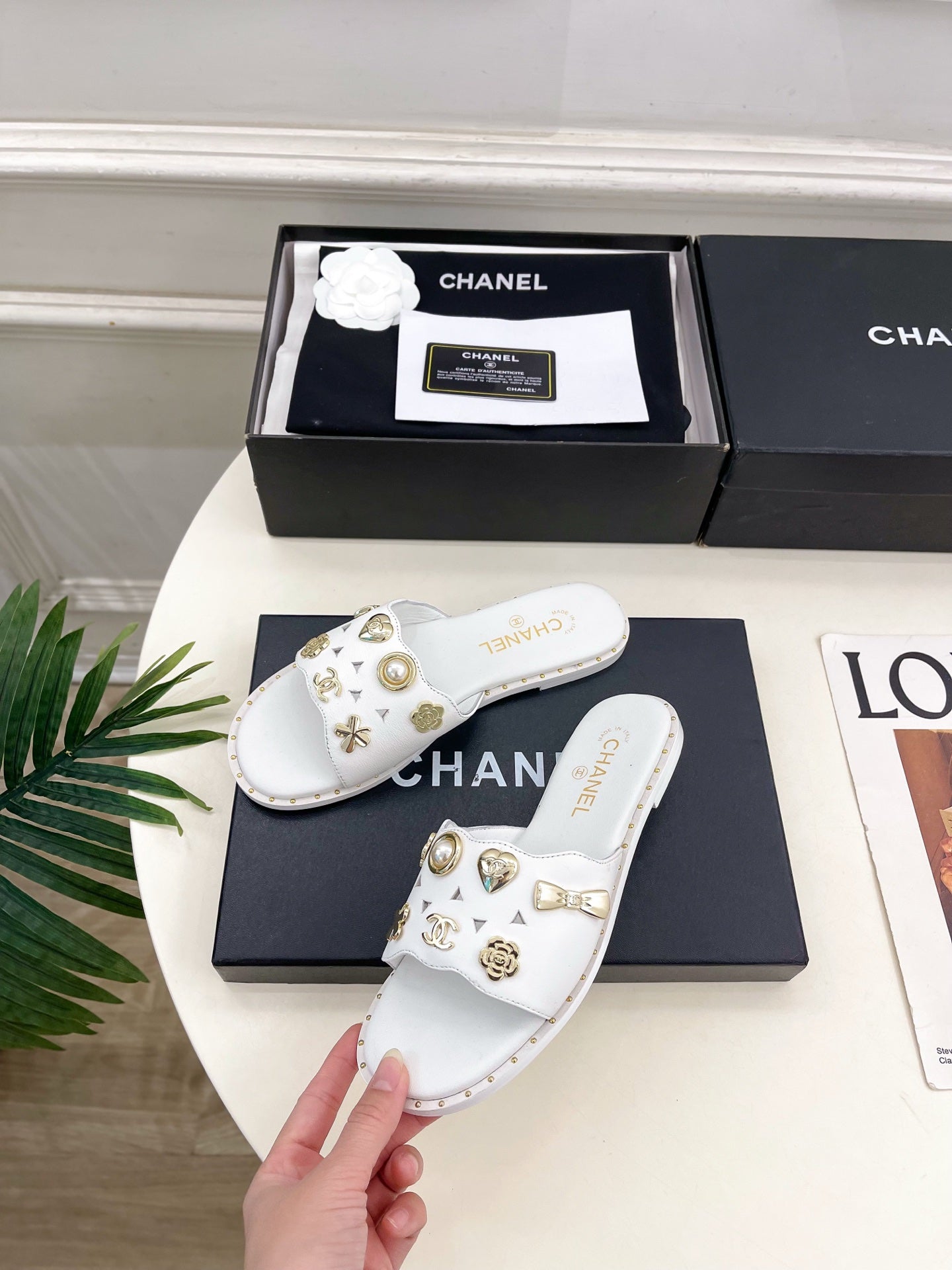 CHANEL 26S FLAT SANDALS IN WHITE LAMBSKIN CHARM-DECORATED