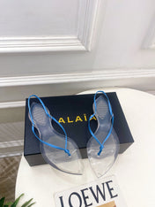 ALAIA 26S POINTED-TOE THONG SANDALS IN BLUE SATIN AND TRANSPARENT PVC