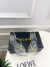ALAIA 26S POINTED-TOE THONG SANDALS IN LIGHT YELLOW SATIN AND TRANSPARENT PVC