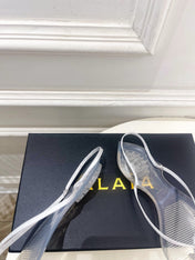 ALAIA 26S POINTED-TOE THONG SANDALS IN WHITE SATIN AND TRANSPARENT PVC