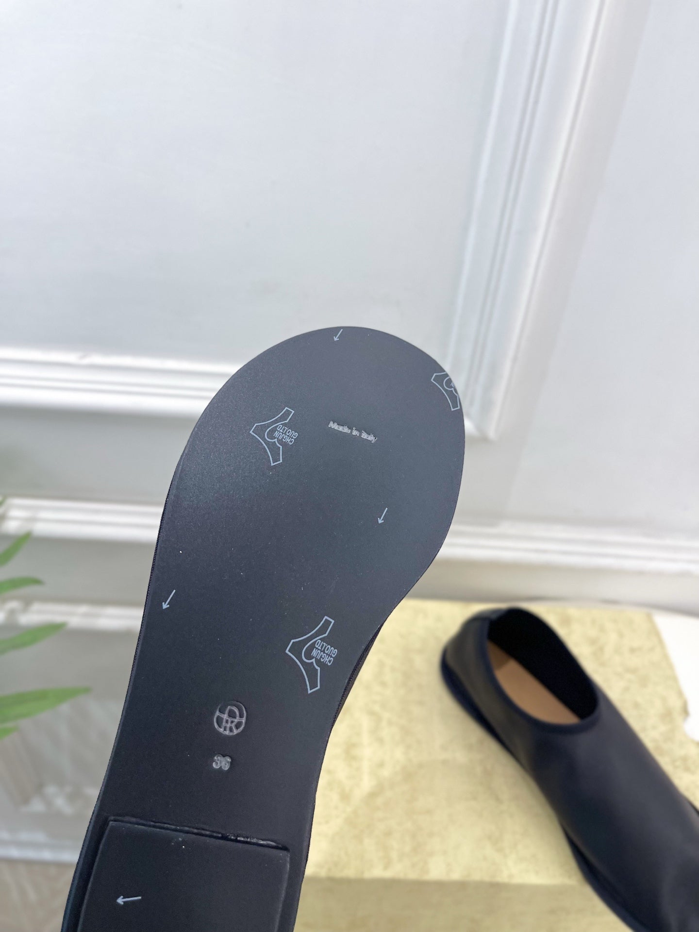 THE ROW 26S SLIP-ON FLATS IN BLACK NAPPA CALFSKIN