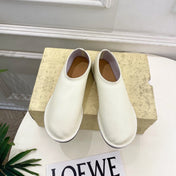 THE ROW 26S SLIP-ON FLATS IN WHITE NAPPA CALFSKIN