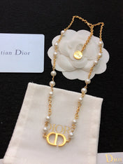 CD 26S CD LOGO PEARL CHAIN NECKLACE IN GOLD TONE METAL WITH WHITE PEARL 631005