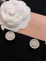MIUMIU 26S CRYSTAL MIU LOGO ROUND STUD EARRINGS IN SILVER TONE METAL 630845