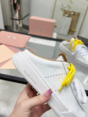SNEAKER MULES IN WHITE MIX BROWN CALFSKIN WHITE  YELLOW LACES