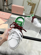 SNEAKER MULES IN WHITE MIX GREEN CALFSKIN WHITE RED LACES