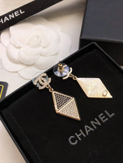 CHANEL 26S DOUBLE C LOGO TWO TONE PAVE CRYSTAL DIAMOND SHAPE DROP EARRINGS IN GOLD METAL 631833